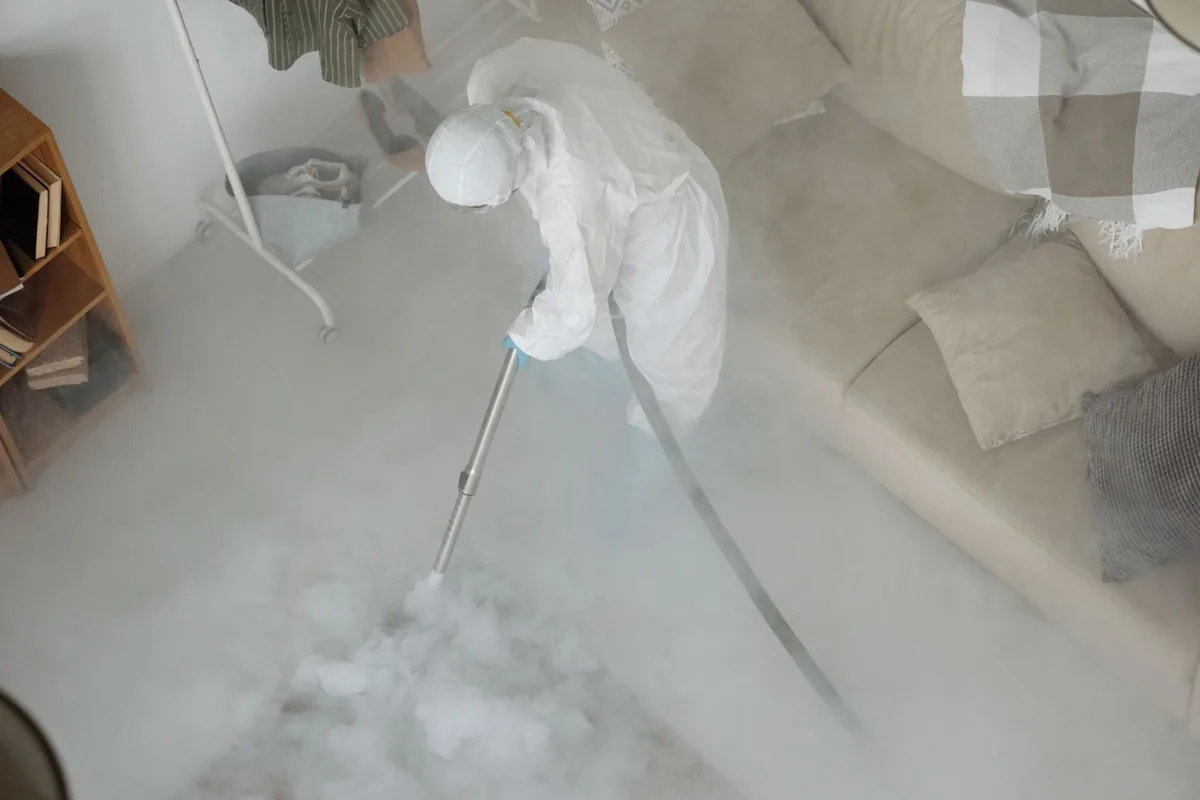 Biohazard cleanup technician in protective equipment, Fountain Hill, PA